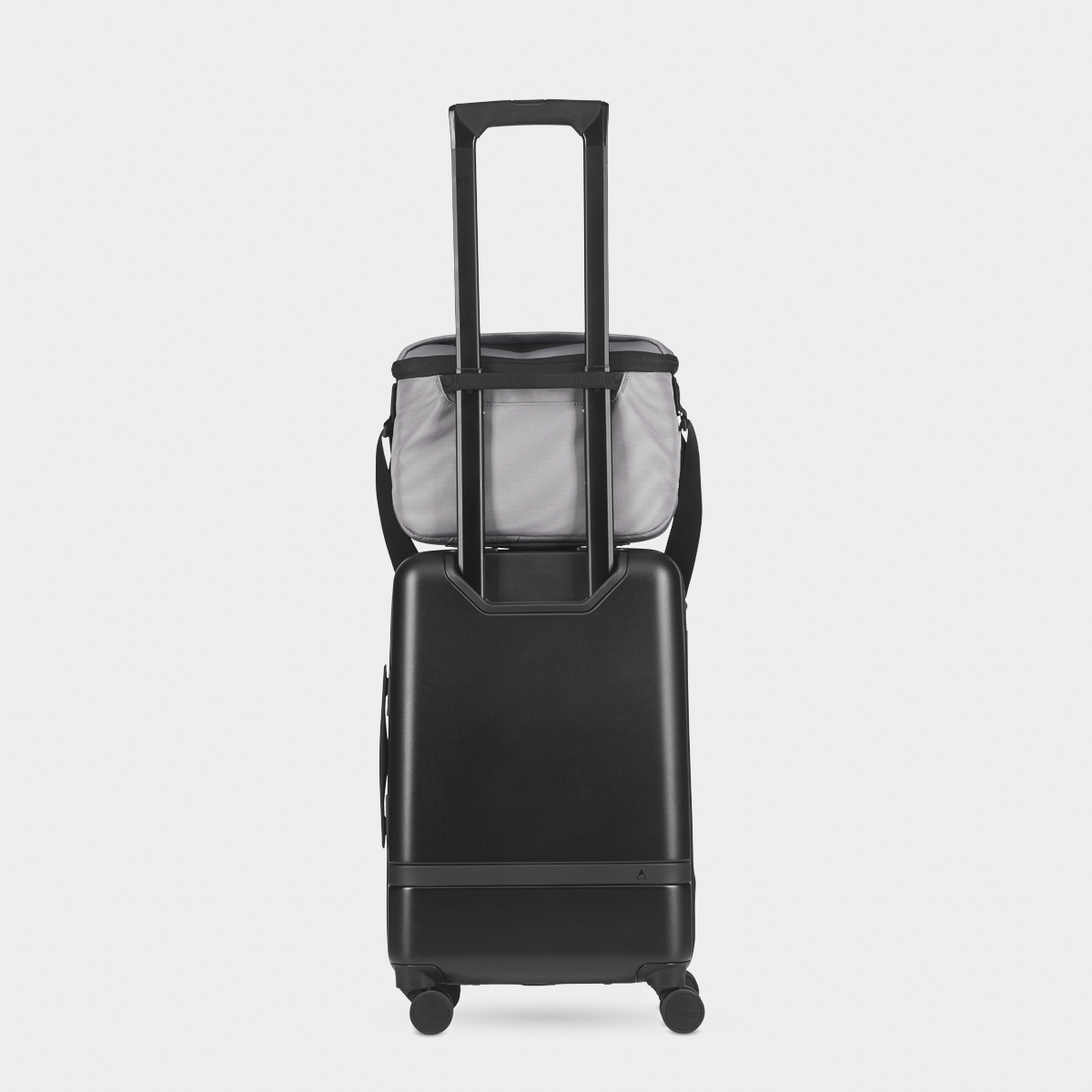 Stone Luma Camera Pack 18L On a Carry-On Back View #color_stone